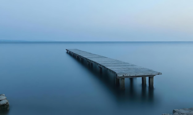 Wooden Pier in Still Water