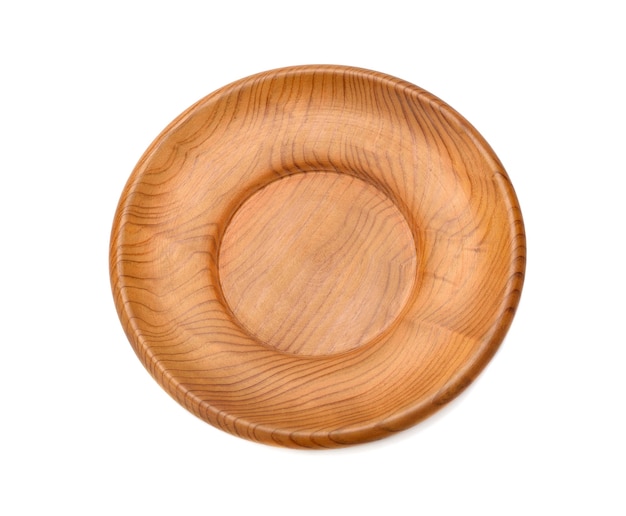 Wooden plate on white surface isolated