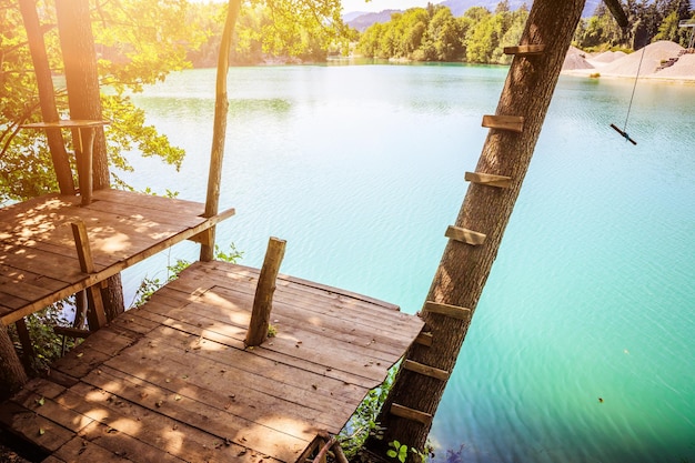 Wooden platform and a beautiful blue lake playground