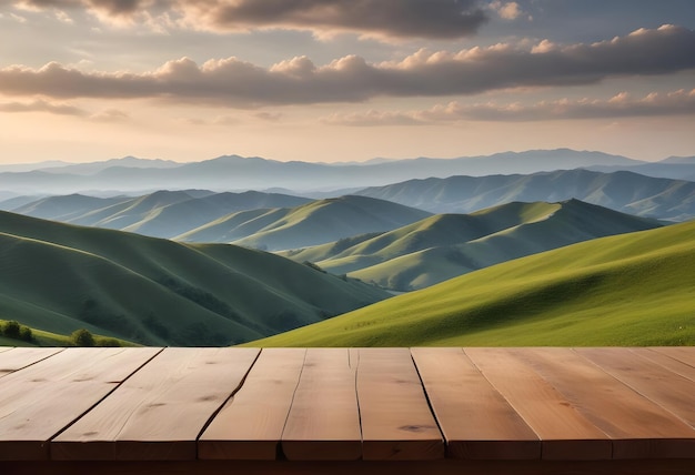 a wooden platform is on a green hill with a mountain range in the background