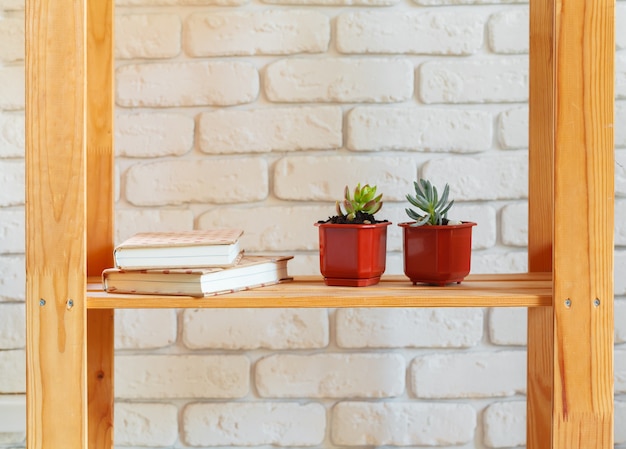 Wooden rack shelf with home decor stuff