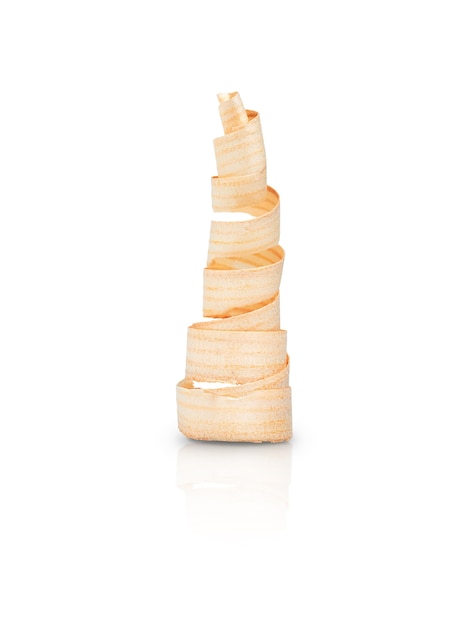 Wooden shavings in the shape of a Christmas tree on a white background with shadow and reflection