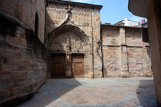 The wooden side door of the Cathedral of Santiago in Bilbao