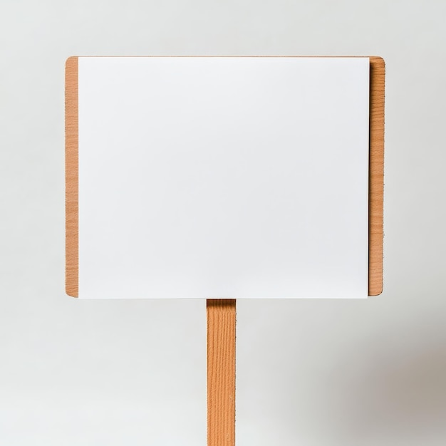 Photo a wooden sign with a white board that says quot blank quot on it