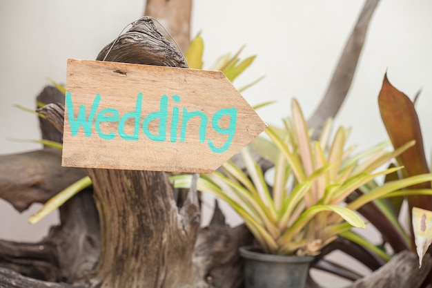 Wooden signboard with the inscription in  paint wedding