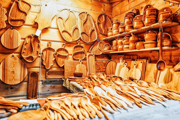 Wooden souvenirs at Christmas market in Riga in Latvia in winter.