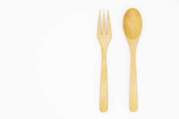 Wooden spoon and fork isolated on white