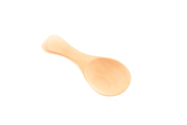 Wooden spoon isolated on white background