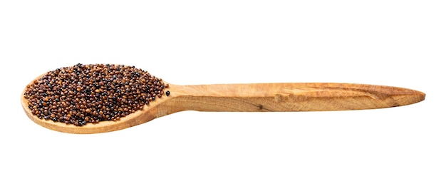 Wooden spoon with canihua grains isolated