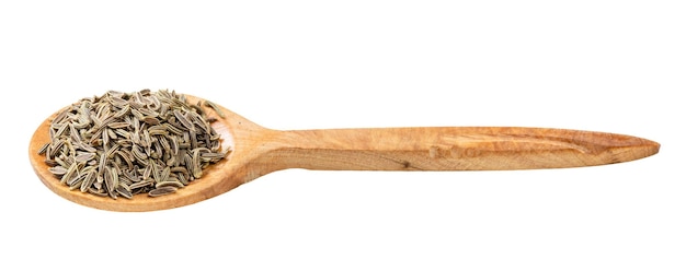 Wooden spoon with kala zeera seeds isolated