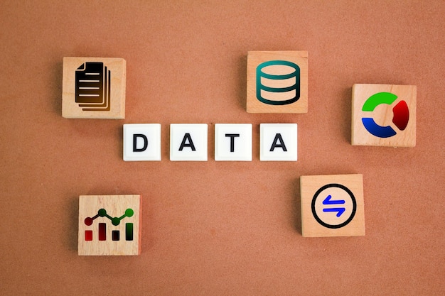 wooden squares and letters of the alphabet with the word data and its icon facts and statistics