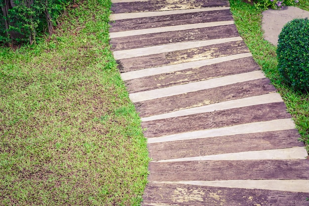 Wooden stairs at the local garden leading down the path