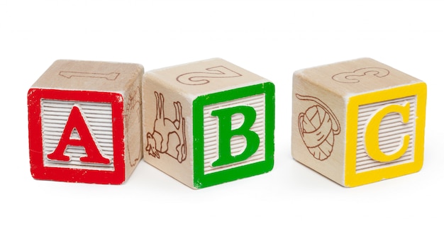 wooden surface alphabet blocks isolated  