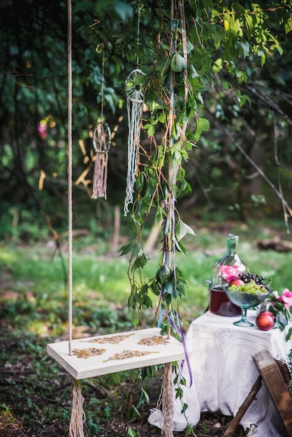 Photo wooden swing with still life