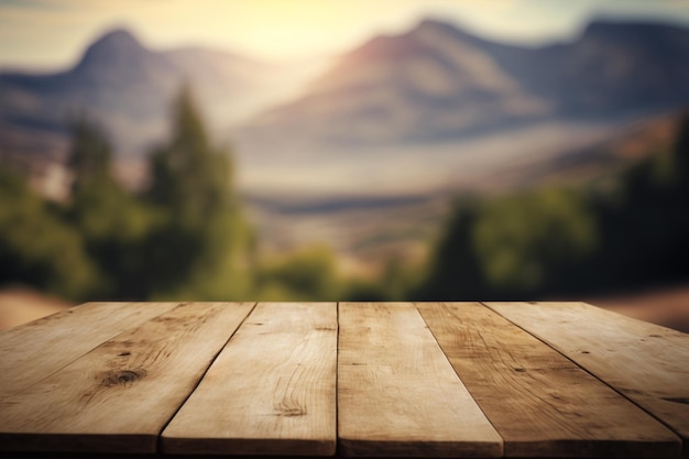 Wooden table and blur of beauty, sunset sky, and mountains as background