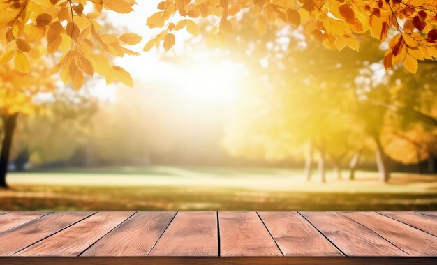 Wooden table and blurred autumn park background Perfect for display of product