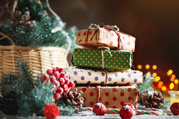 Wooden table decorated with Christmas gifts  Horizontal