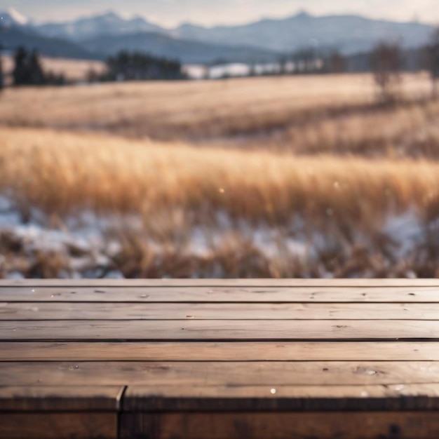 A wooden table sits alone in a snowy field