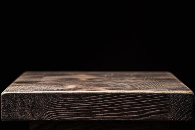 a wooden table with a black background with a dark background