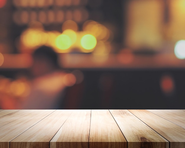 A wooden table with a blurry background