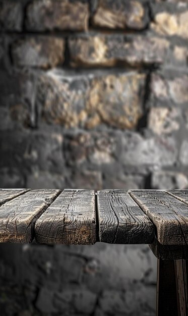 Photo a wooden table with a brick wall and a brick wall behind it