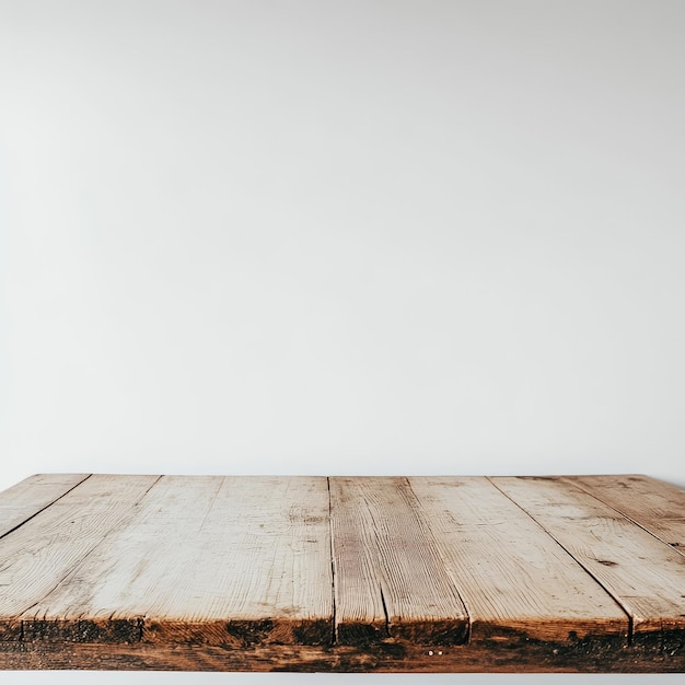 a wooden table with a white background with a few pieces of wood on it