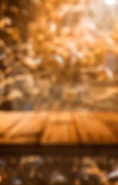 Photo a wooden table with a wood surface and a blurry background