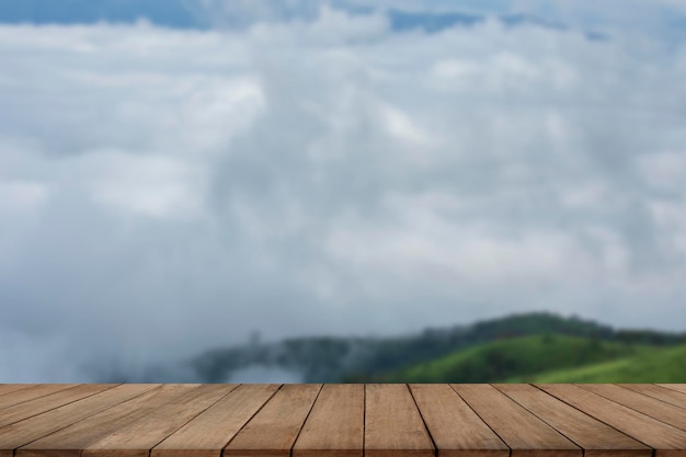 Wooden tables and blur of the background Morning misty landscape