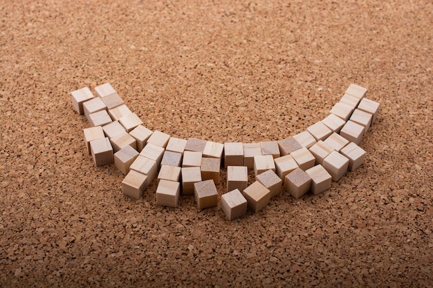 Wooden toy cubes as educational game object on white background