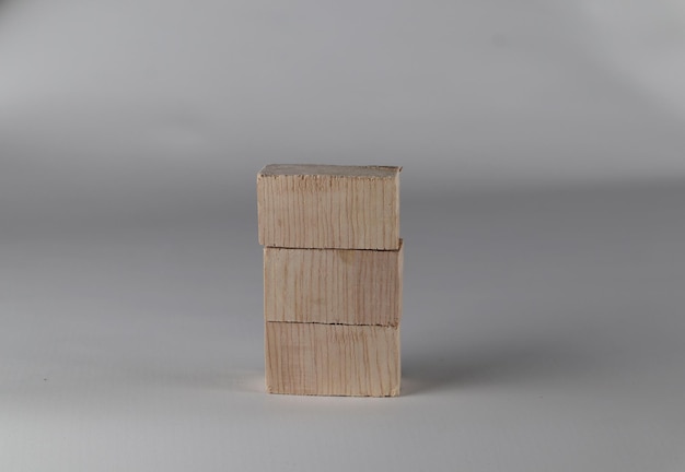 Wooden toy cubes on a white background