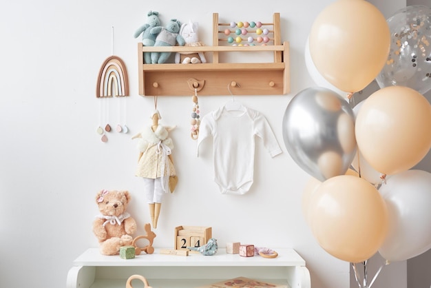 Wooden toys in the children's room chest of drawers and a white bed the interior of the children's bedroom