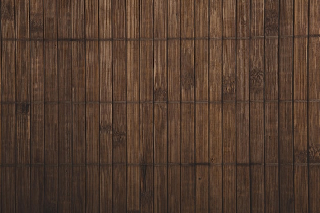 A wooden wall with a black box in the middle