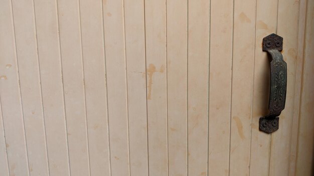 A wooden wall with a stain on it