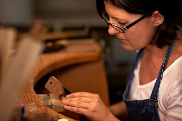 Woodworking industry and woman in workshop for creative project furniture or sculpture Artisan industrial and young female carpenter manufacturing craft or products in studio for small business