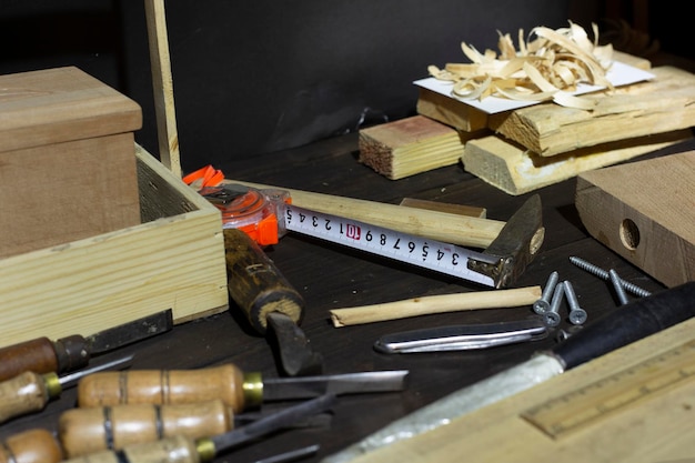 woodworking tools chisels on a wooden background