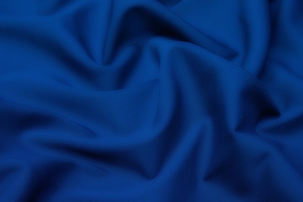 Wool fabric. Color black and blue. Texture, background, pattern.