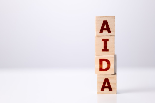 Word AIDA with wood building blocks business concept