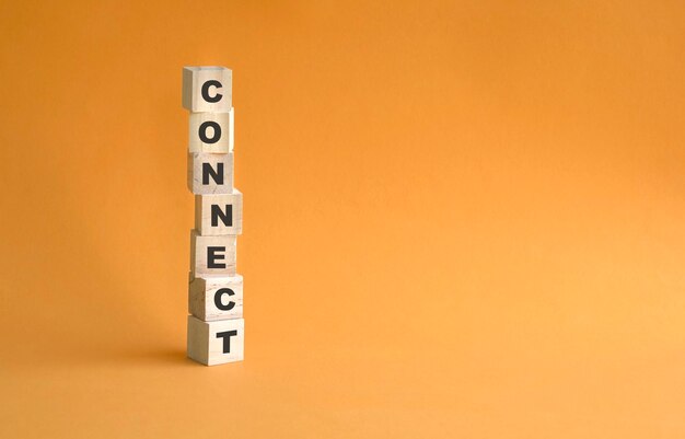 Word Connect written on wood cubes stacked up