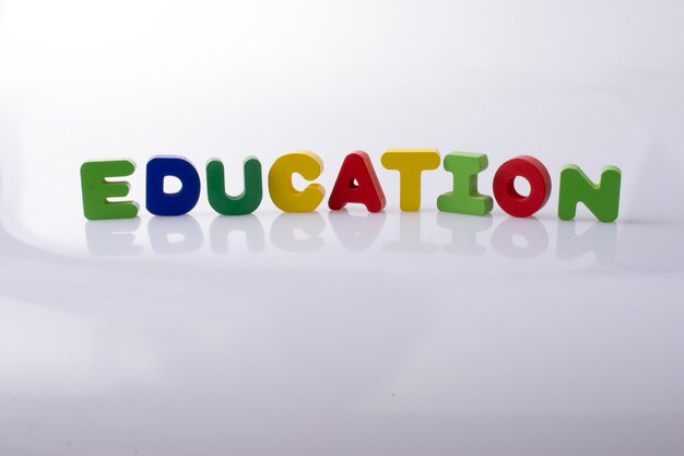 The word EDUCATION written with letter blocks