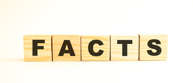 The word FACTS Wooden cubes with letters