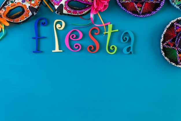 Word Fiesta on a bright painted wood background.