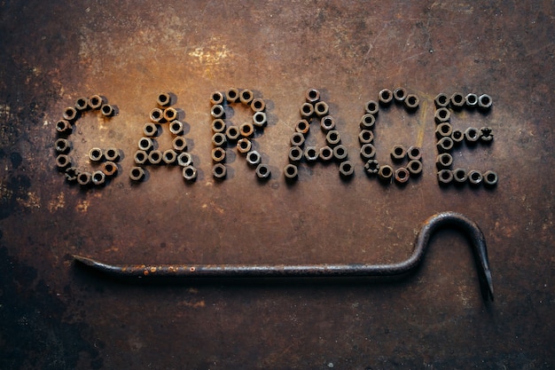 Word garage made of screw-nuts