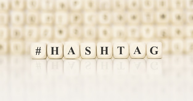 Word HASHTAG made with wood building blocks