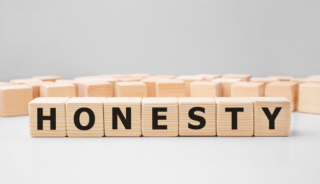 Word HONESTY made with wood building blocks