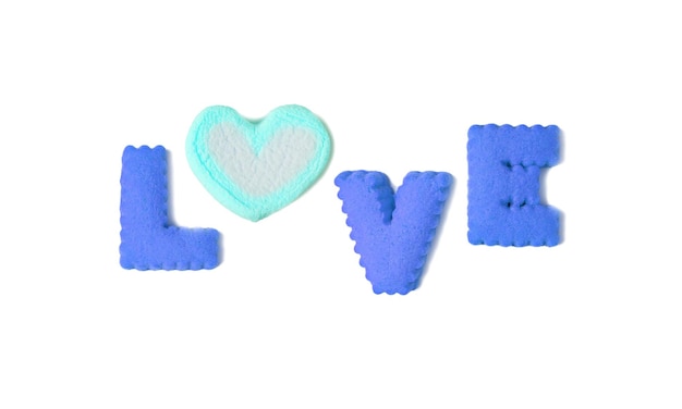 The word LOVE spelled with blue alphabet cookies and cyan marshmallow candy