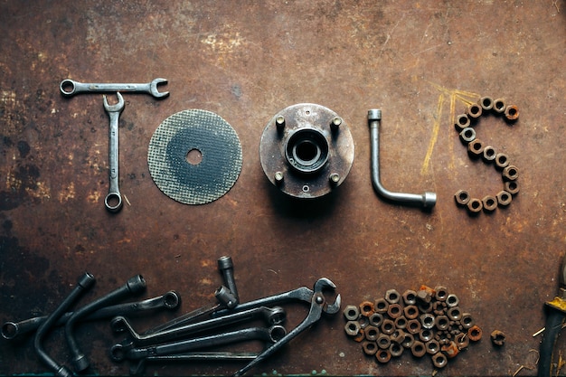 The word made of screw nuts wrenches and pliers