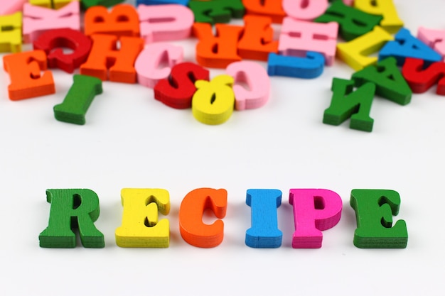 The word recipe with colored letters