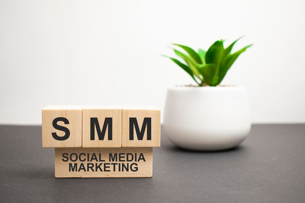 Word SMM is made of wooden building blocks Concept High quality photo