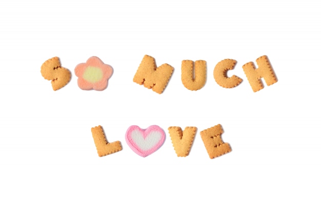 The word SO MUCH LOVE spelled with alphabet biscuits and marshmallow