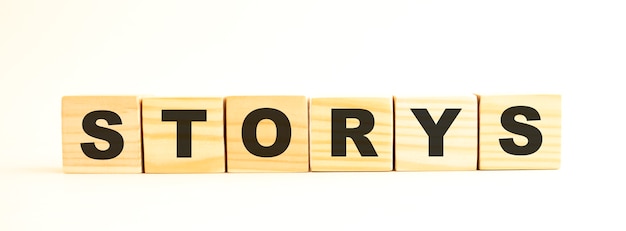 The word STORYS in wooden cubes with letters